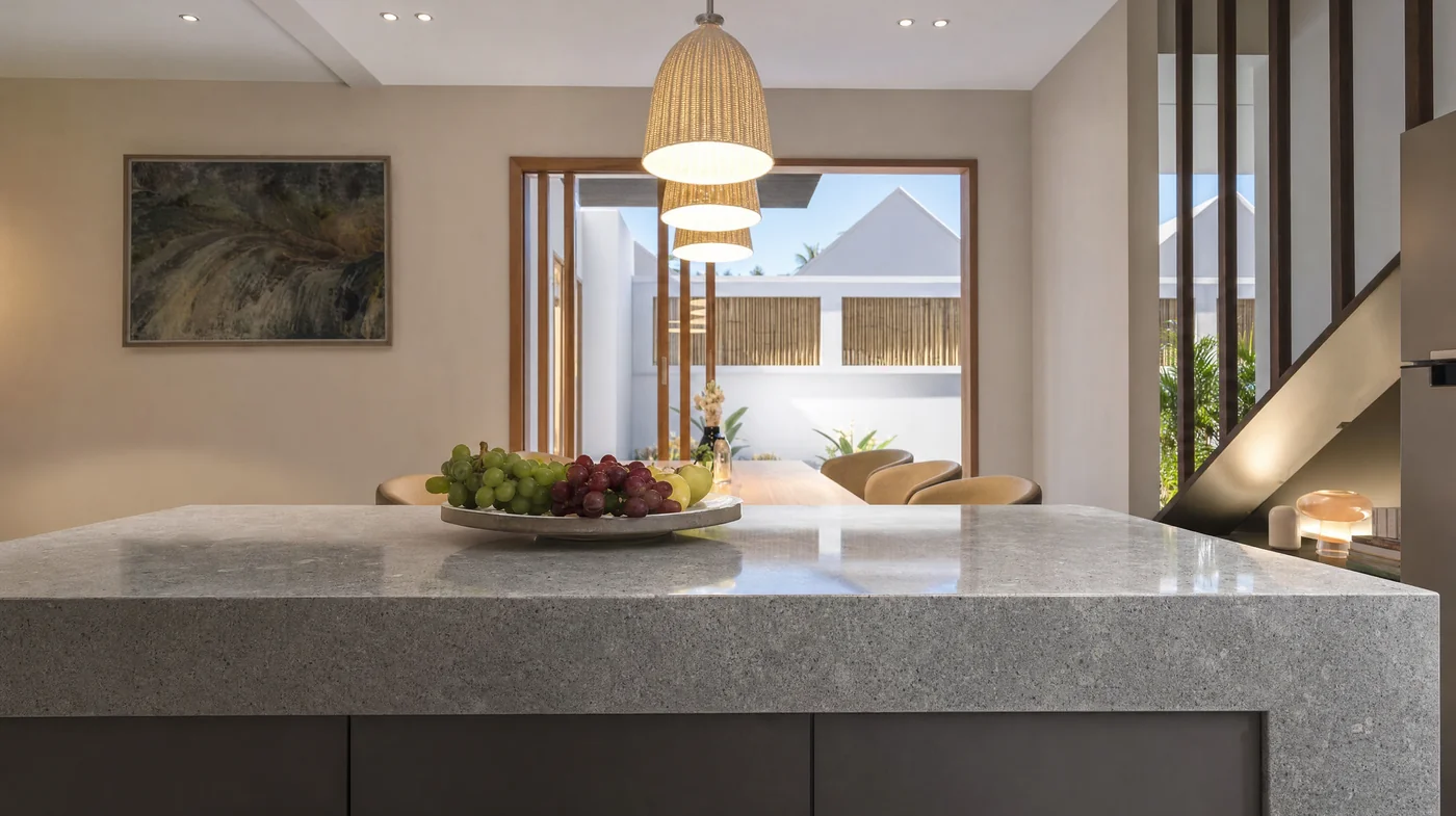 The kitchen bench and the brick splashback